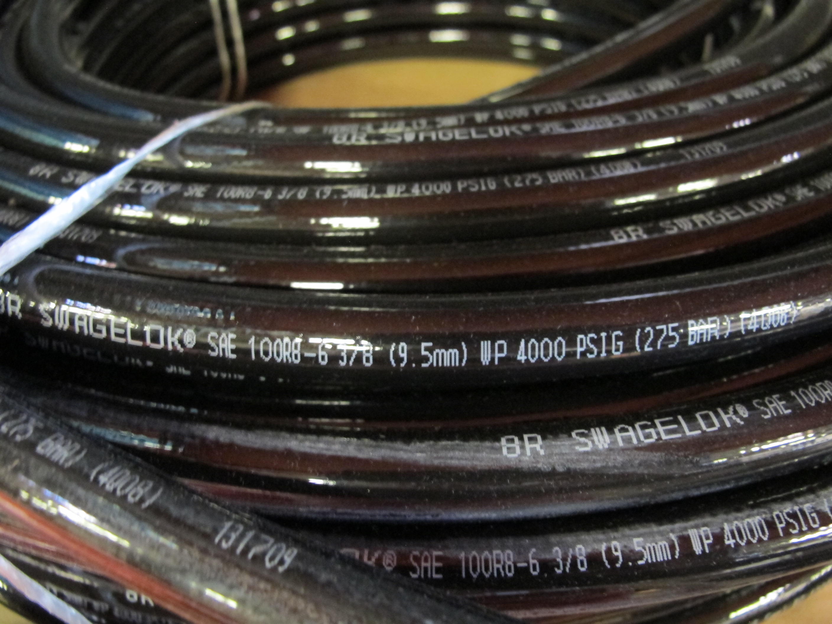 LOT TO INCLUDE: (3 ROLLS) PARKER PARFLEX NONCONDUCTIVE HOSING, (2) ROLLS SWAGELOK HOSING, (2) GOODYEAR FLAME RESISTANT HOSING, (2) EASTMAN HYTRON HOSING. LOADING & HANDLING FEE $15-4551
